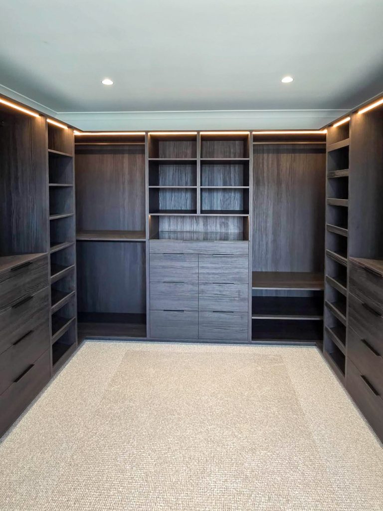 Bespoke walk-in wardrobe with adjustable shelving